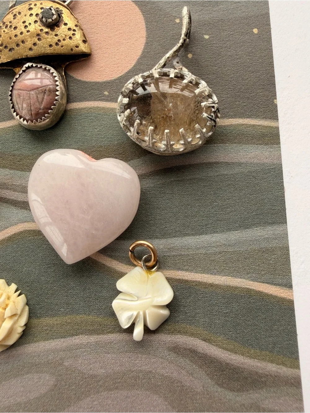 Vintage and handmade whimsical charms, pendants stones.